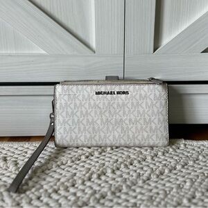 Michael Kors Cream Wristlet with Logo Pattern